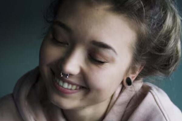 The Rise of the smiley piercing: Why This Trend is Taking Over